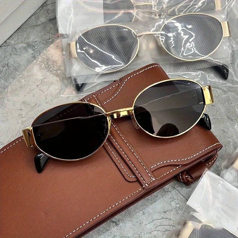 Lightweight women’s oval sunglasses – metal frame, UV400 protection, for everyday wear