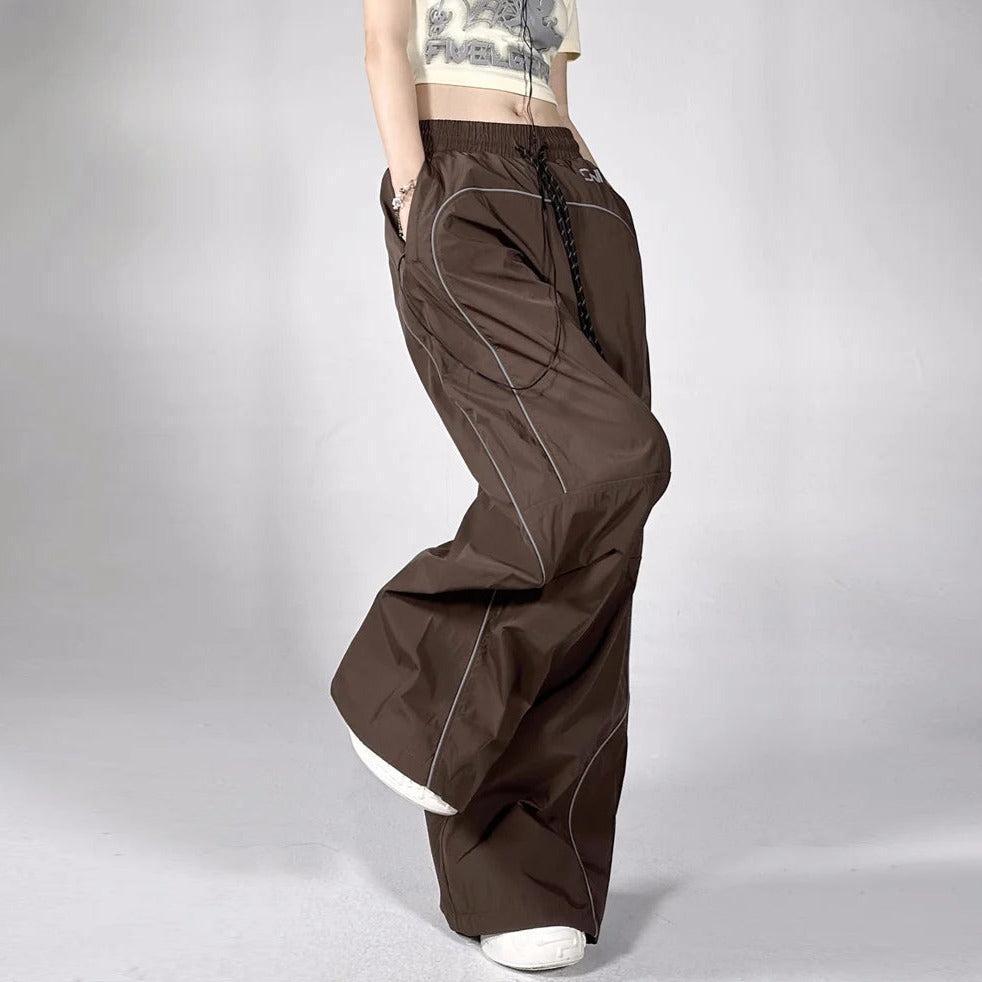 Brown Parachute Pants with Adjustable Drawcord, Six-Pocket Design, Oversized Fit for Casual and Urban Wear