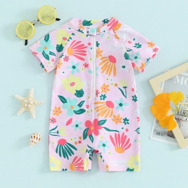 Soft girls’ rash guard romper – zip-front, short sleeve, floral print, polyester, for summer swimwear